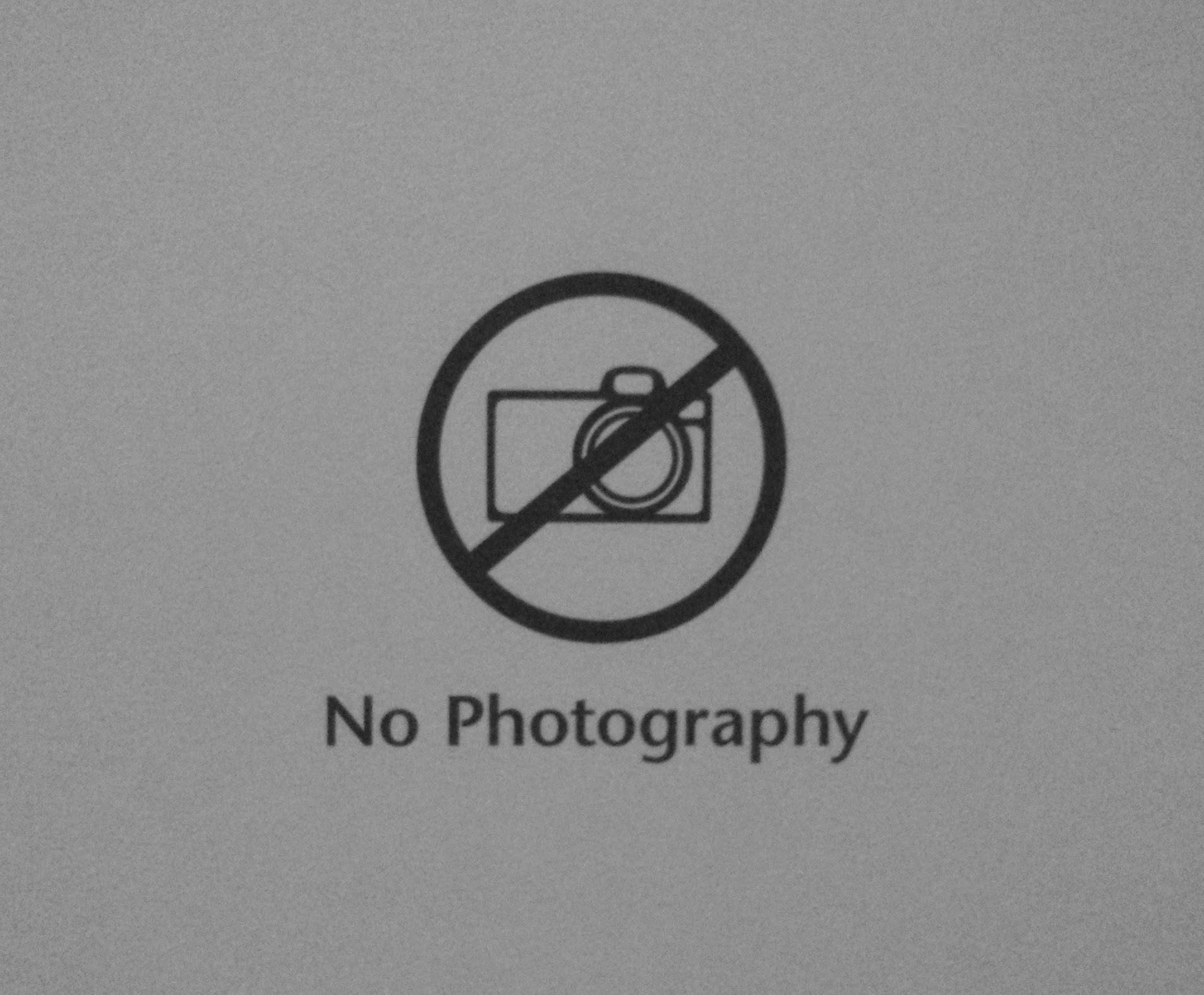 Photo of a no photography sign.