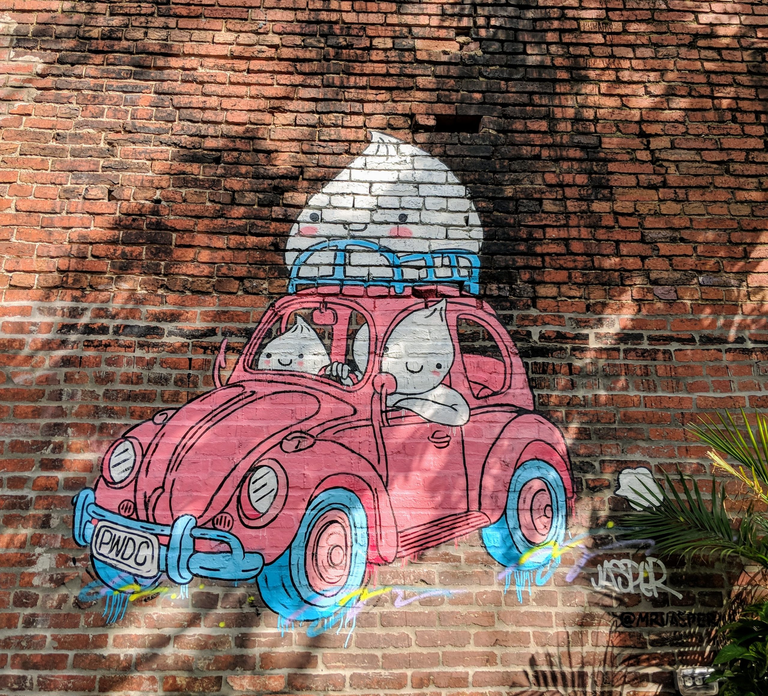 Mural of steamed buns in a car.