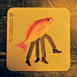 Photo of a coster that has a gold fish with four human legs in mens dress clothes.