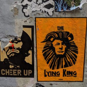 Street art of Donald Trump as a lion.
